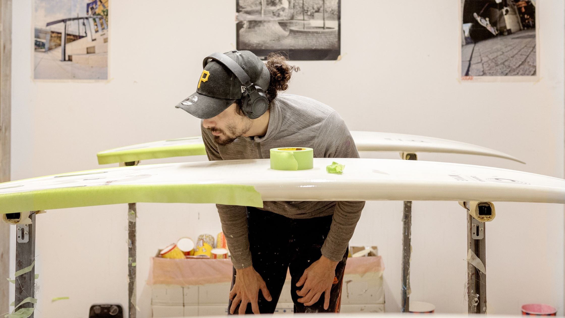 a surfboard shaper looking at it creation